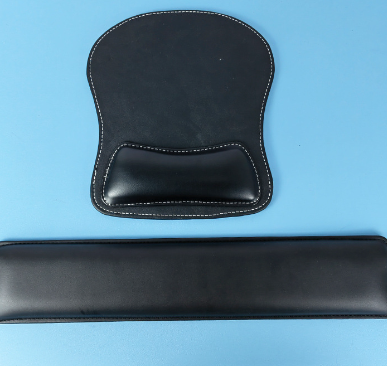 Memory foam keyboard and mouse wrist rest set on a desk