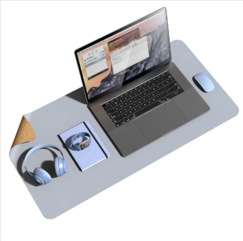 Cork and leather dual-sided desk pad with laptop and mouse